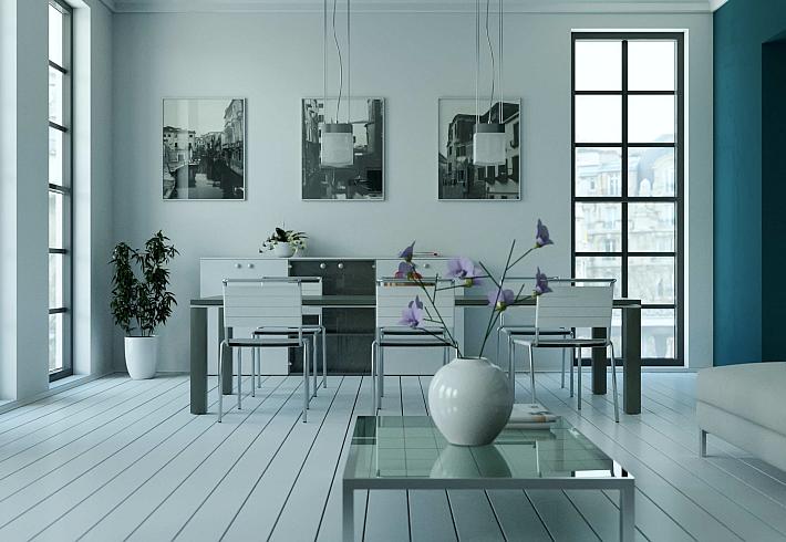 A modern dining room with white floors and a tall, black steel-look window with a grid pattern