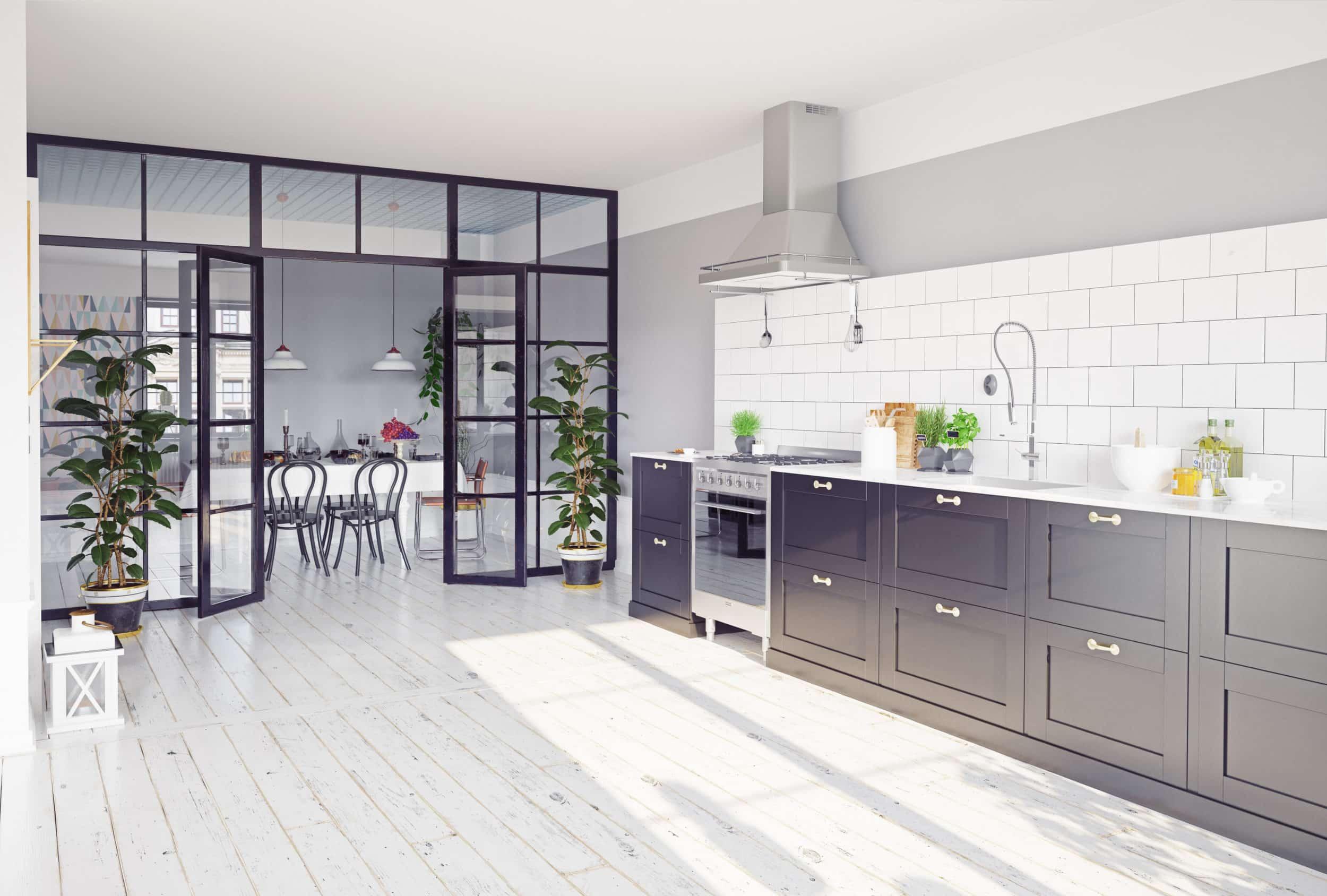 Modern kitchen viewing a dining room through an open black Aluco steel-look screen and double doors