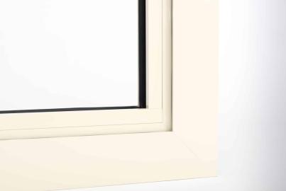 A macro shot of the corner joint on a cream-coloured Origin window frame, showing the slim profile