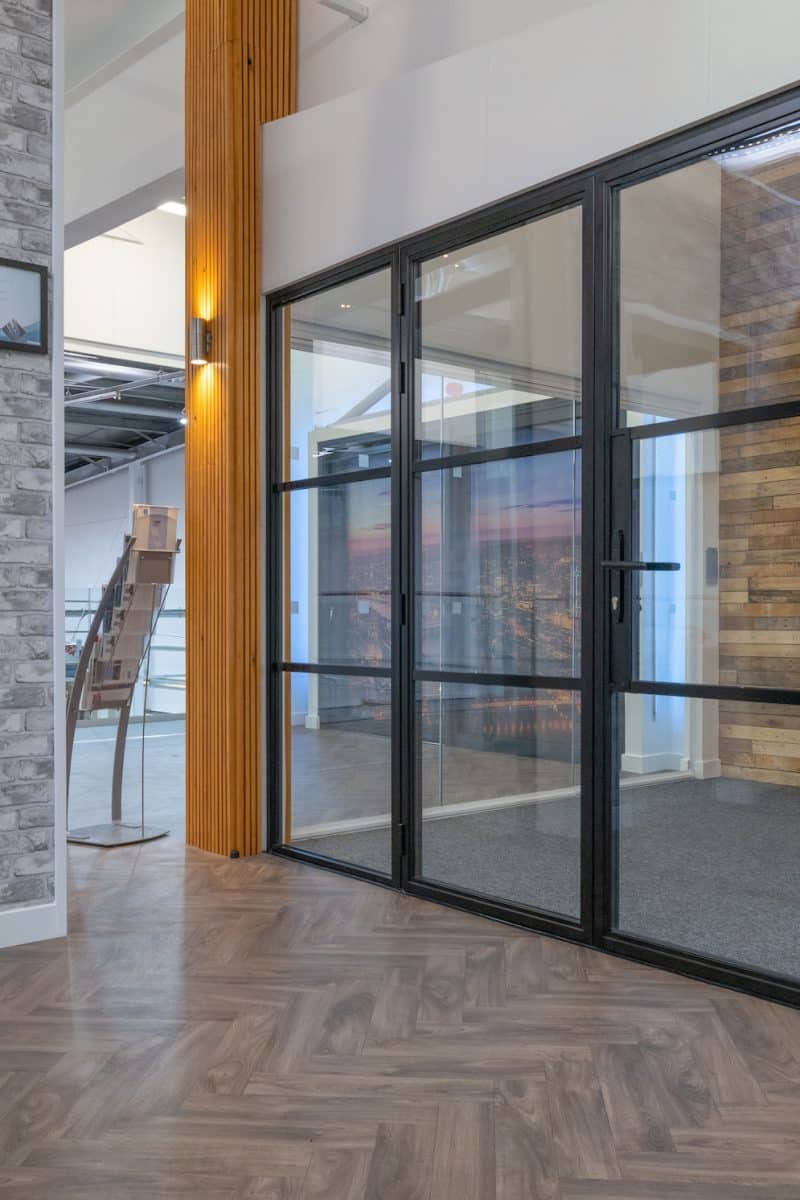 aluco doors and screen in a showroom