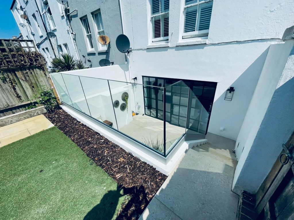 glass balustrades and steel look french doors in tunbridge wells