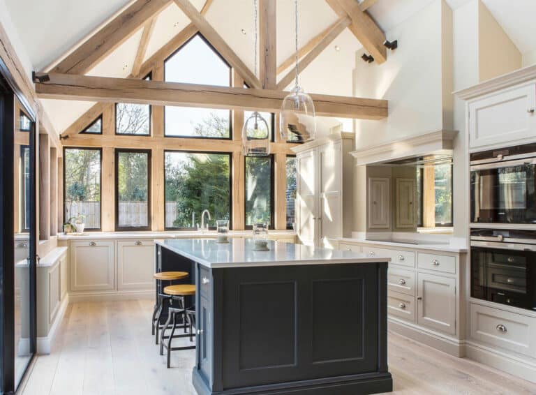 black steel replacement windows in a vaulted ceiling extension